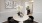 a dining room with art on the wall
