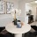 a dining room with art on the wall