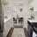 a kitchen with a white tile backsplash