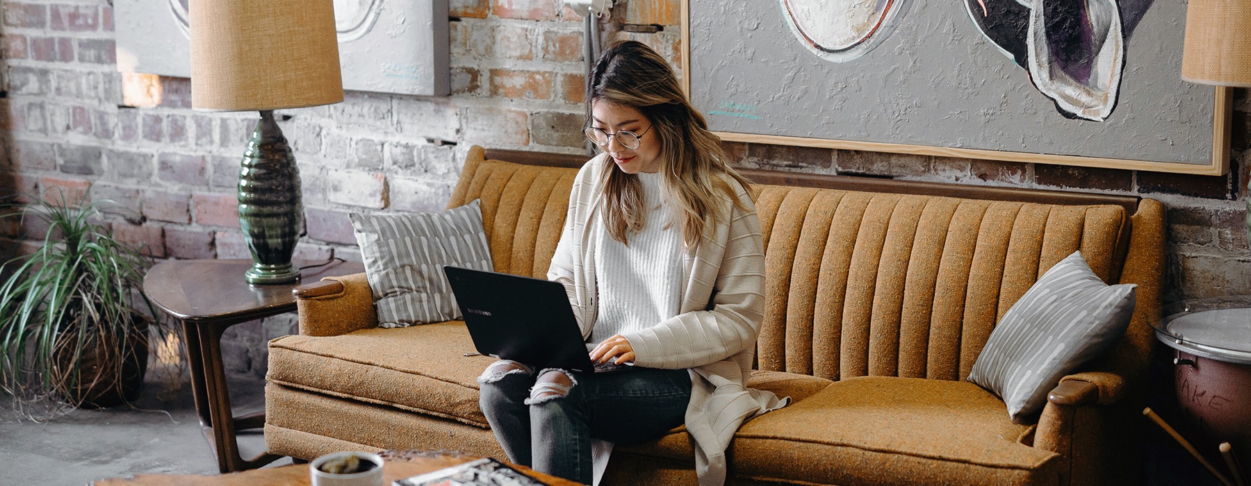 a woman sitting on a couch